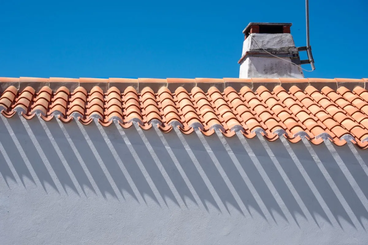 Roof ridge line and chimney on a home in Ogden, UT