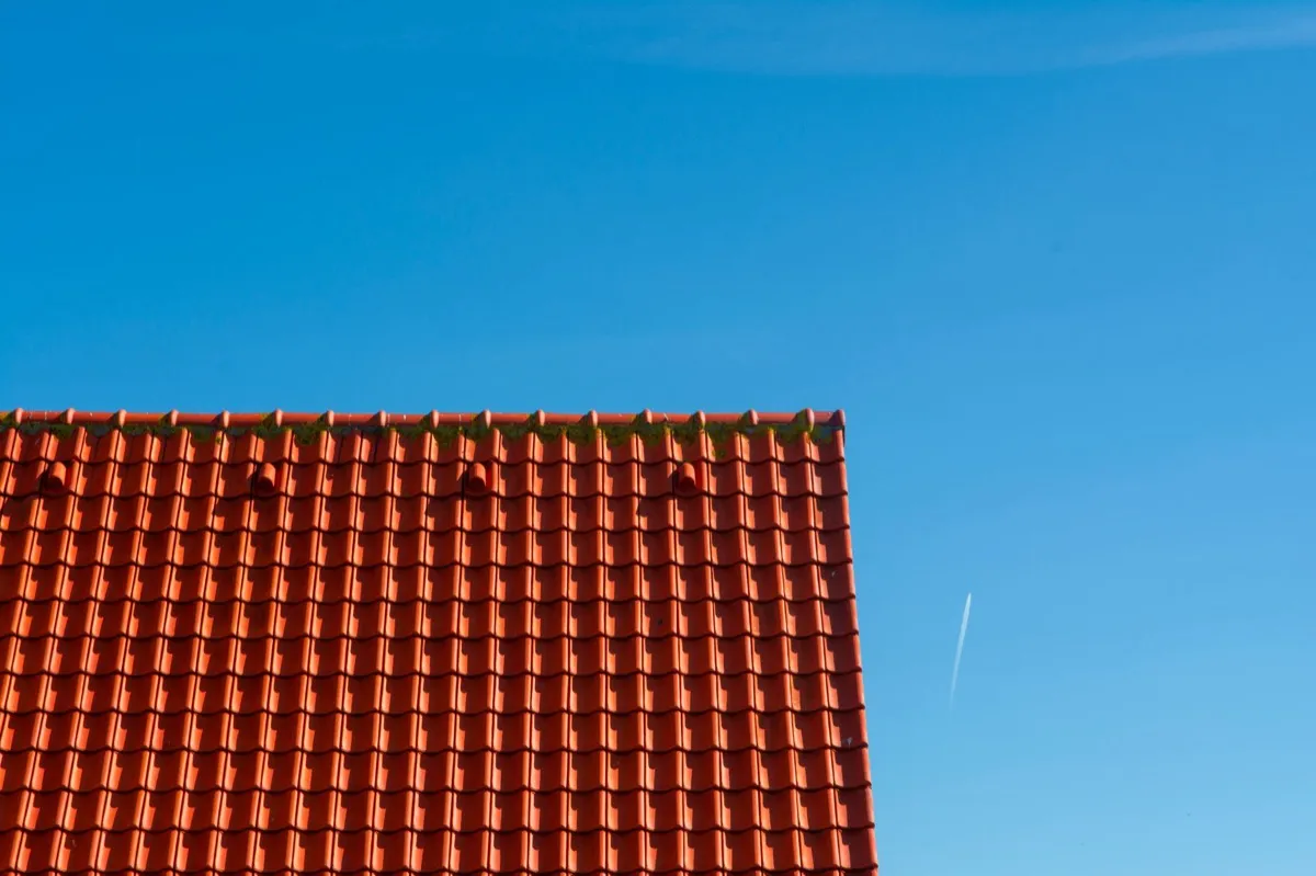 Tile roof gable in full sun, the kind of exposure that sets roof life in Ogden, UT